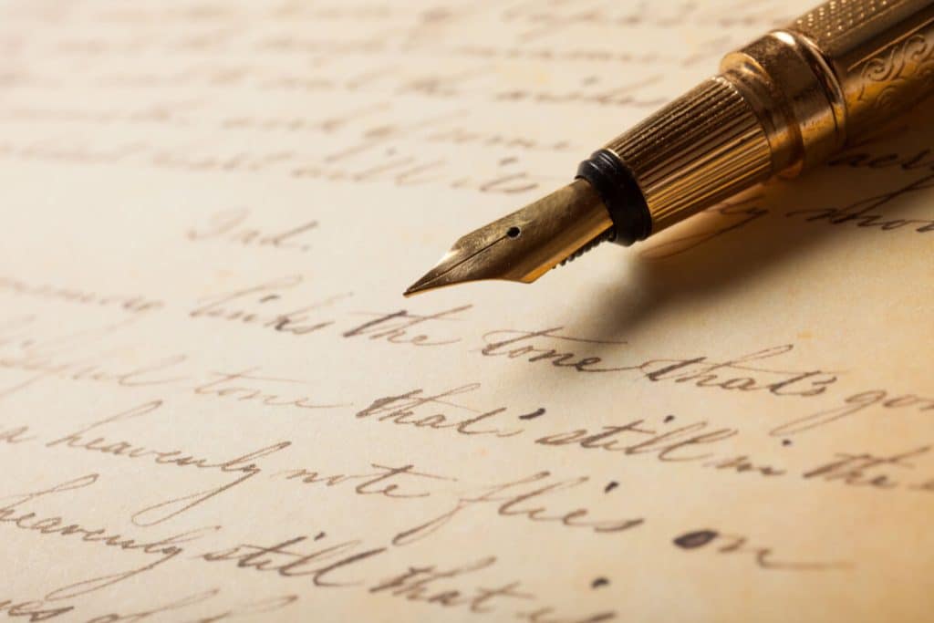 pluma-papel-escrito